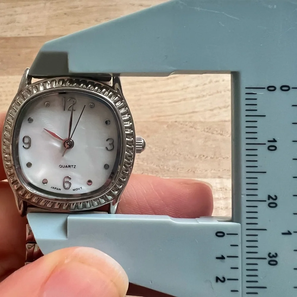 Ladies mother of pearl dial stainless steel bracelet watch NEW BATTERY